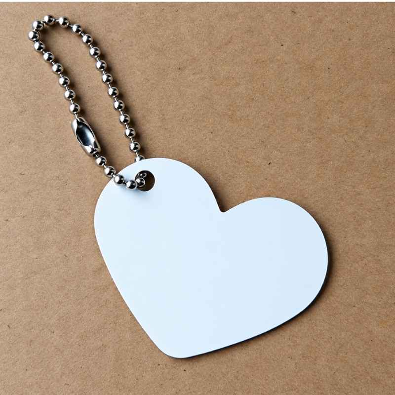 Plaquita de aluminio en forma de corazón